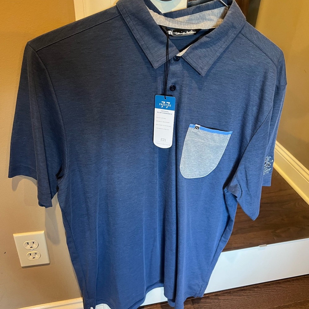 Travis Mathew Navy Polo with Light Gray Pocket
